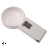 White, round lens hand held magnifier with grey on/off switch on rectangular handle labeled 4x.