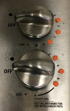 Image of bump dots placed on a stove dial. 