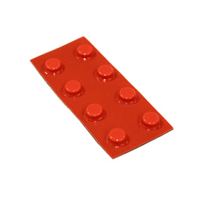 Sheet of 8 medium sized, orange, round, flat top bump dots on white background.